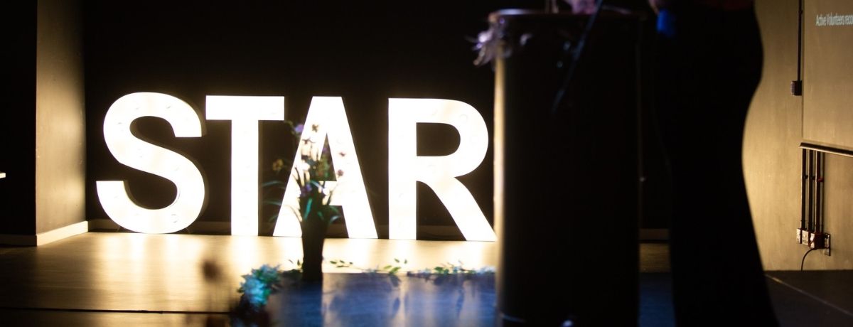 Light box letters spelling out STAR