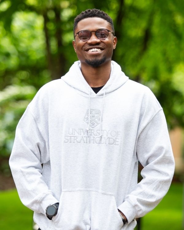 Student wearing grey Strathclyde merch hoodie